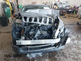 2015 Jeep Cherokee Limited with VIN 1C4PJLDB0FW505891, listed as a IAAI auction lot 41620674 with 120,804 mi miles and . Bid and sale history available at DreamBid. Image 6.