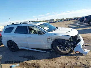 2023 Dodge Durango R/T Plus with VIN 1C4SDHCT5PC589797, listed as a IAAI auction lot 41472148 with 34,980 mi miles and . Bid and sale history available at DreamBid. Image 13.