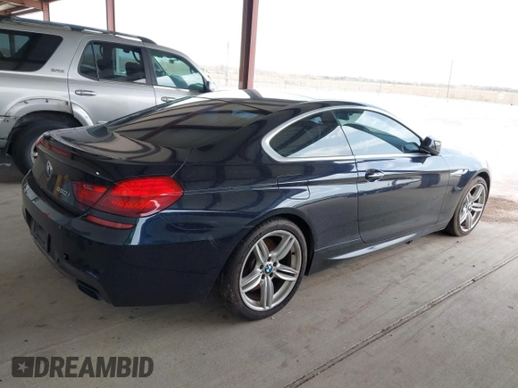 2012 BMW 6 Series 650i z VIN WBALX3C51CDV77602, wystawiony jako IAAI lot #41668235 z przebiegiem 103 684 mil mil oraz . Historia ofert i sprzedaży dostępna na DreamBid. Obrazek 4.
