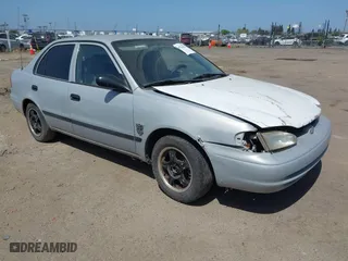 2000 Chevrolet Prizm LSi with VIN 1Y1SK5287YZ408470, listed as a IAAI auction lot 42116829 with 237,089 mi miles. Bid and sale history available at carsss.com. Image 1.