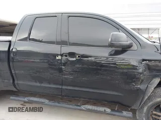 2014 Toyota Tundra 4WD Truck SR with VIN 5TFUM5F14EX051843, listed as a IAAI auction lot 41773983 with 145,089 mi miles. Bid and sale history available at carsss.com. Image 13.