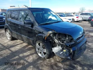 2010 Kia Soul + with VIN KNDJT2A22A7114453, listed as a IAAI auction lot 41597098 with 129,575 mi miles. Bid and sale history available at carsss.com. Image 1.