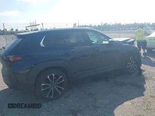 2023 Mazda CX-50 S Premium Plus with VIN 7MMVABEM1PN141344, listed as a IAAI auction lot 41473823 with 12,120 mi miles and . Bid and sale history available at DreamBid. Image 4.
