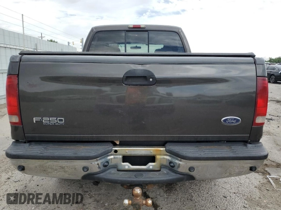 2006 Ford F-250 XL z VIN 1FTSW21P76EB60709, wystawiony jako Copart lot #62276565 z przebiegiem 241 373 mil mil oraz Szkoda całkowita • Salvage title. Historia ofert i sprzedaży dostępna na DreamBid. Obrazek 6.