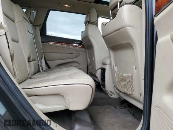 2011 Jeep Grand Cherokee Overland with VIN 1J4RS6GG1BC636963, listed as a Copart auction lot 87654425 with 189,736 mi miles and Salvage Title. Bid and sale history available at DreamBid. Image 11.