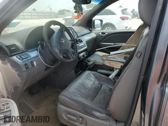 2010 Honda Odyssey EX-L с VIN 5FNRL3H76AB091537, выставлен на аукционе Copart как лот 60861615 с пробегом Не указан миль и Чистый • Clean title. История ставок и продаж доступна на DreamBid. Изображение 7.