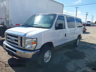 2008 Ford Econoline Passenger XL with VIN 1FBNE31L18DA20963, listed as a IAAI auction lot 41869182 with 150,027 mi miles. Bid and sale history available at carsss.com. Image 2.