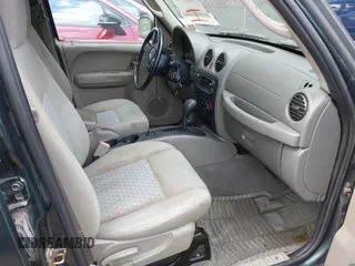 2005 Jeep Liberty Sport with VIN 1J4GL48K15W557730, listed as a IAAI auction lot 42214736 with 182,045 mi miles and . Bid and sale history available at carsss.com. Image 5.