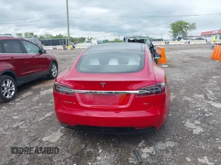 2018 Tesla Model S 75D with VIN 5YJSA1E21JF275546, listed as a IAAI auction lot 42061595 with Not Provided miles and . Bid and sale history available at DreamBid. Image 16.