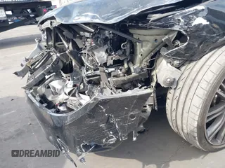 2018 BMW 5 Series 540i z VIN WBAJE5C5XJWA97667, wystawiony jako IAAI lot #41481362 z przebiegiem Nie podano mil oraz . Historia ofert i sprzedaży dostępna na DreamBid. Obrazek 6.