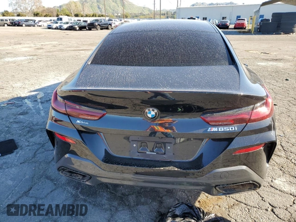 2023 BMW 8 Series M850i with VIN WBAGV8C06PCL57473, listed as a Copart auction lot 39398193 with Not provided miles and . Bid and sale history available at DreamBid. Image 6.
