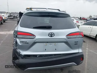 2023 Toyota Corolla Cross XLE with VIN 7MUEAABG8PV077117, listed as a IAAI auction lot 42052305 with 21,571 mi miles and . Bid and sale history available at DreamBid. Image 15.