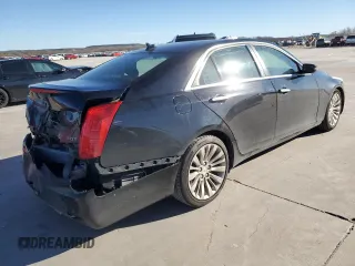 2014 Cadillac CTS Performance RWD with VIN 1G6AS5SX7E0184479, listed as a Copart auction lot 87076074 with 121,927 mi miles and Clean title. Bid and sale history available at DreamBid. Image 3.