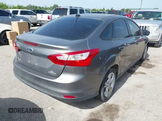 2013 Ford Focus SE with VIN 1FADP3F23DL131327, listed as a IAAI auction lot 42577474 with 146,412 mi miles and . Bid and sale history available at DreamBid. Image 4.