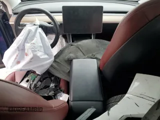 2020 Tesla Model Y Long Range z VIN 5YJYGDEE7LF057909, wystawiony jako Copart lot #50435535 z przebiegiem Nie podano mil oraz Nie do naprawy • Non repairable. Historia ofert i sprzedaży dostępna na DreamBid. Obrazek 8.