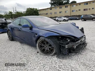 2023 Tesla Model S with VIN 5YJSA1E58PF498685, listed as a Copart auction lot 41690475 with Not provided miles and Salvage title. Bid and sale history available at DreamBid. Image 4.