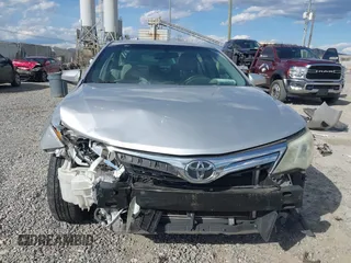 2014 Toyota Camry L with VIN 4T1BF1FK3EU301041, listed as a IAAI auction lot 41858386 with 136,998 mi miles and . Bid and sale history available at DreamBid. Image 6.
