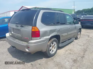 2003 GMC Envoy SLE z VIN 1GKDT13S632213799, wystawiony jako IAAI lot #42470437 z przebiegiem 289 728 mil mil oraz . Historia ofert i sprzedaży dostępna na DreamBid. Obrazek 4.