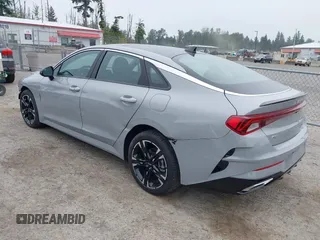 2022 Kia K5 GT-Line z VIN 5XXG64J2XNG133729, wystawiony jako IAAI lot #42440669 z przebiegiem 36 376 mil mil oraz . Historia ofert i sprzedaży dostępna na DreamBid. Obrazek 3.