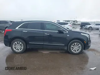 2017 Cadillac XT5 FWD with VIN 1GYKNARS0HZ317508, listed as a IAAI auction lot 40818768 with 132,598 mi miles. Bid and sale history available at carsss.com. Image 13.
