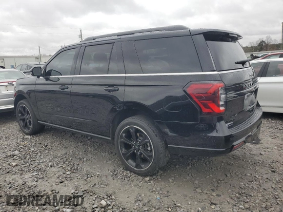 2023 Ford Expedition Limited with VIN 1FMJU1K85PEA53495, listed as a Copart auction lot 86630534 with 52,618 mi miles and Salvage Title. Bid and sale history available at carsss.com. Image 2.