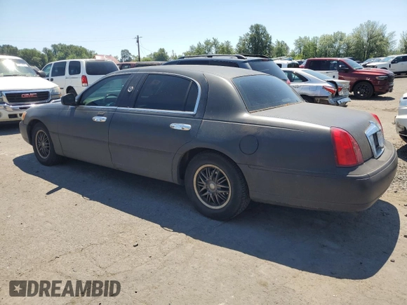 2001 Lincoln Town Car Cartier L z VIN 1LNHM85W71Y624315, wystawiony jako Copart lot #60479385 z przebiegiem 171 485 mil mil oraz Czysty tytuł • Clean title. Historia ofert i sprzedaży dostępna na DreamBid. Obrazek 2.