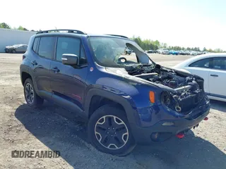 2017 Jeep Renegade Deserthawk z VIN ZACCJBCBXHPE70318, wystawiony jako IAAI lot #41922391 z przebiegiem Nie podano mil oraz . Historia ofert i sprzedaży dostępna na DreamBid. Obrazek 1.