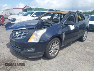 2014 Cadillac SRX Performance Collection with VIN 3GYFNCE31ES599632, listed as a IAAI auction lot 42757876 with Not provided miles and . Bid and sale history available at DreamBid. Image 2.