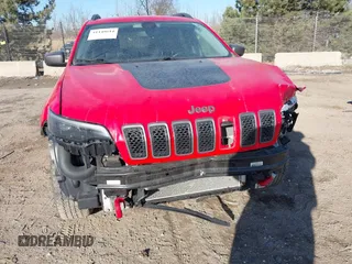2019 Jeep Cherokee Trailhawk Elite with VIN 1C4PJMBX3KD217437, listed as a IAAI auction lot 41448614 with 85,889 mi miles. Bid and sale history available at carsss.com. Image 18.
