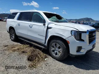 2022 GMC Yukon XL SLE with VIN 1GKS2FKD6NR117790, listed as a Copart auction lot 56965464 with 23,371 mi miles and Salvage Title. Bid and sale history available at carsss.com. Image 4.