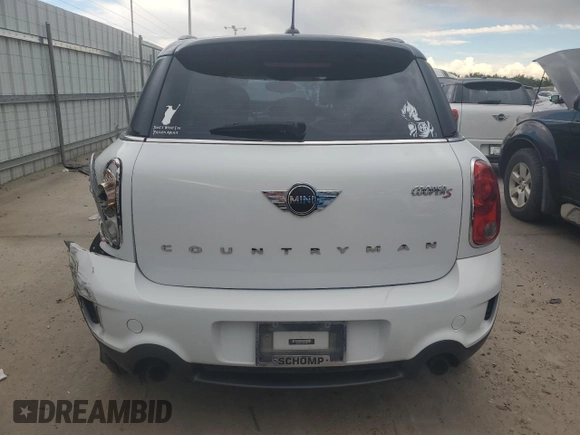 2014 MINI Countryman S z VIN WMWZC3C57EWP51864, wystawiony jako Copart lot #71233944 z przebiegiem 73 828 mil mil oraz Szkoda całkowita • Salvage title. Historia ofert i sprzedaży dostępna na DreamBid. Obrazek 6.