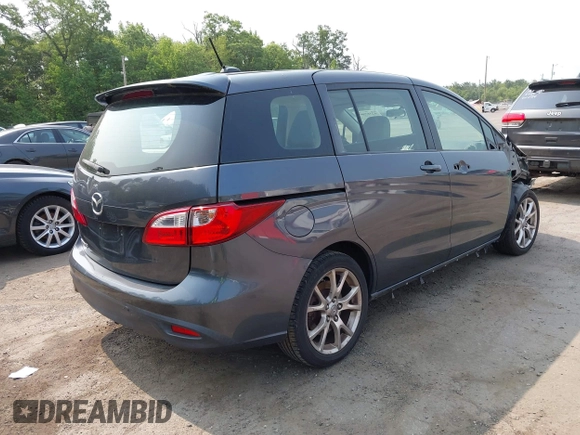 2012 Mazda 5 Touring z VIN JM1CW2CL5C0126744, wystawiony jako IAAI lot #42385667 z przebiegiem 140 150 mil mil oraz . Historia ofert i sprzedaży dostępna na DreamBid. Obrazek 4.