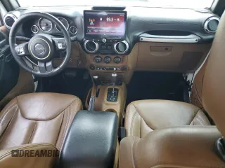 2015 Jeep Wrangler Unlimited Sahara with VIN 1C4HJWEG7FL671259, listed as a Copart auction lot 60151225 with 81,281 mi miles and Clean title. Bid and sale history available at DreamBid. Image 8.