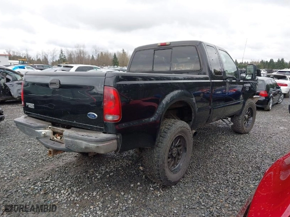 1999 Ford Super Duty F-250 XL with VIN 1FTNX21F2XEC99584, listed as a IAAI auction lot 41611098 with 424,263 mi miles. Bid and sale history available at carsss.com. Image 4.