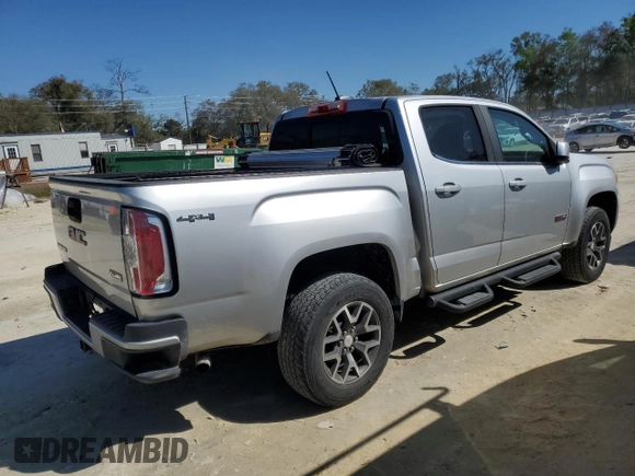 2016 GMC Canyon 4WD SLE with VIN 1GTG6CE36G1354255, listed as a Copart auction lot 48460605 with 106,280 mi miles and Salvage Title. Bid and sale history available at carsss.com. Image 3.