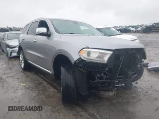 2014 Dodge Durango Citadel with VIN 1C4SDJET1EC303963, listed as a IAAI auction lot 42341328 with 154,876 mi miles and . Bid and sale history available at DreamBid. Image 1.