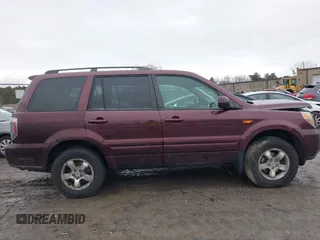 2007 Honda Pilot EX-L with VIN 2HKYF18557H535426, listed as a IAAI auction lot 41126160 with 169,336 mi miles. Bid and sale history available at carsss.com. Image 13.