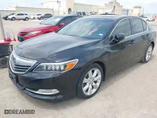 2014 Acura RLX with VIN JH4KC1F36EC002427, listed as a IAAI auction lot 42099583 with 114,671 mi miles. Bid and sale history available at carsss.com. Image 2.