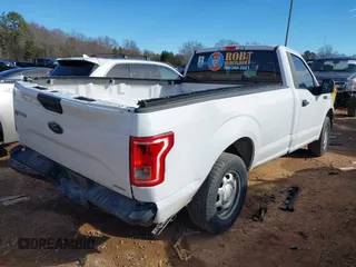 2016 Ford F-150 XL with VIN 1FTMF1C85GKE69350, listed as a IAAI auction lot 41690906 with 162,338 mi miles. Bid and sale history available at carsss.com. Image 4.