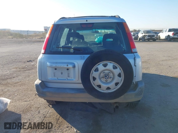 1999 Honda CR-V LX with VIN JHLRD284XXC019021, listed as a IAAI auction lot 41031098 with 204,206 mi miles. Bid and sale history available at carsss.com. Image 16.