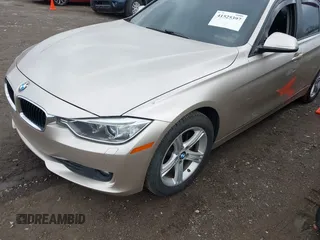 2013 BMW 3 Series 328i xDrive with VIN WBA3B3C57DF530904, listed as a IAAI auction lot 41525397 with 158,310 mi miles and . Bid and sale history available at DreamBid. Image 2.