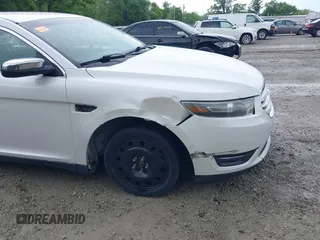 2014 Ford Taurus Limited with VIN 1FAHP2F82EG121267, listed as a IAAI auction lot 42377620 with 123,199 mi miles and . Bid and sale history available at DreamBid. Image 6.