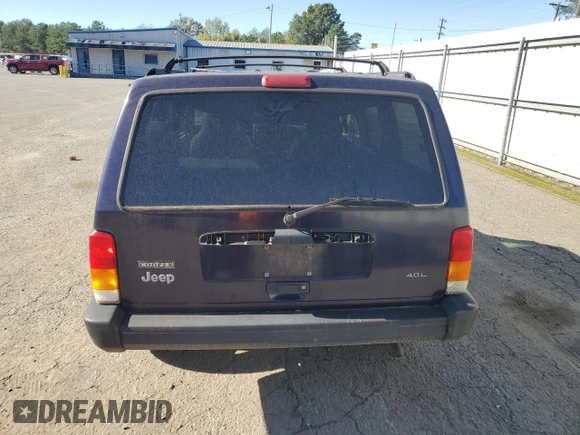 1998 Jeep Cherokee Sport with VIN 1J4FT68S5WL136989, listed as a Copart auction lot 81035084 with 140,848 mi miles and Salvage Title. Bid and sale history available at carsss.com. Image 6.