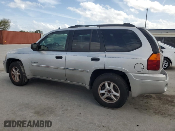 2006 GMC Envoy SLT with VIN 1GKDS13S662139632, listed as a Copart auction lot 47387245 with 246,803 mi miles and Salvage Title. Bid and sale history available at carsss.com. Image 2.
