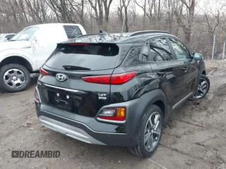 2021 Hyundai Kona Ultimate with VIN KM8K5CA59MU657508, listed as a IAAI auction lot 41144378 with 15,828 mi miles. Bid and sale history available at carsss.com. Image 4.