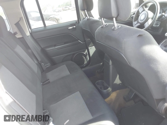2016 Jeep Patriot Sport with VIN 1C4NJPBA3GD693490, listed as a IAAI auction lot 42086206 with 130,968 mi miles. Bid and sale history available at carsss.com. Image 8.