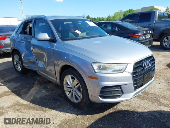 2017 Audi Q3 Premium with VIN WA1ECCFSXHR002623, listed as a IAAI auction lot 42077132 with 118,511 mi miles and . Bid and sale history available at DreamBid. Image 1.