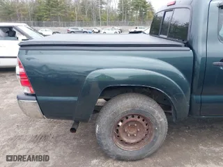 2009 Toyota Tacoma with VIN 3TMLU42N09M031972, listed as a IAAI auction lot 42001100 with 163,567 mi miles. Bid and sale history available at carsss.com. Image 6.