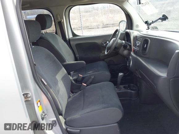 2009 Nissan Cube SL z VIN JN8AZ28R99T111414, wystawiony jako IAAI lot #41542454 z przebiegiem 117 297 mil mil oraz . Historia ofert i sprzedaży dostępna na DreamBid. Obrazek 5.