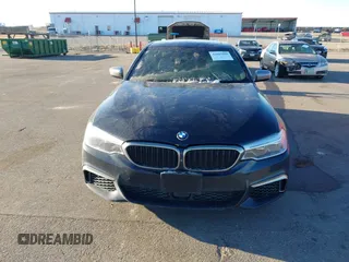 2018 BMW 5 Series M550i xDrive with VIN WBAJB9C59JG463948, listed as a IAAI auction lot 41845989 with 99,385 mi miles. Bid and sale history available at carsss.com. Image 12.